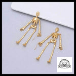 Boucles D’oreilles Tête de Mort Squelettes Dorés