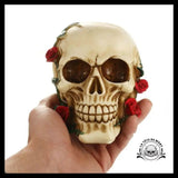 Sculpture Tête de Mort Crâne Roses Rouges Grimpantes